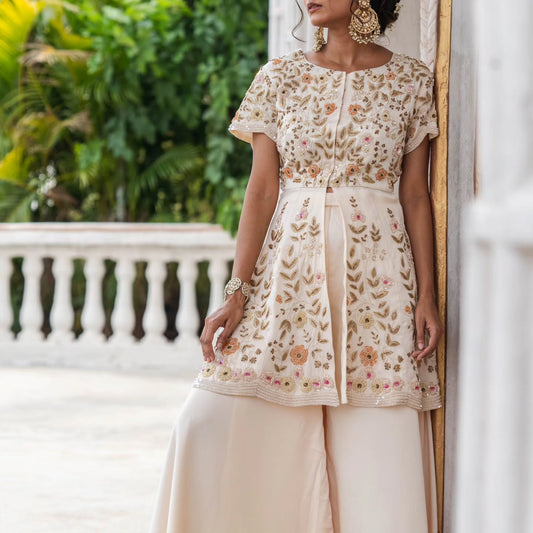 White satin organza peplum top with heavy satin lehenga pallazo