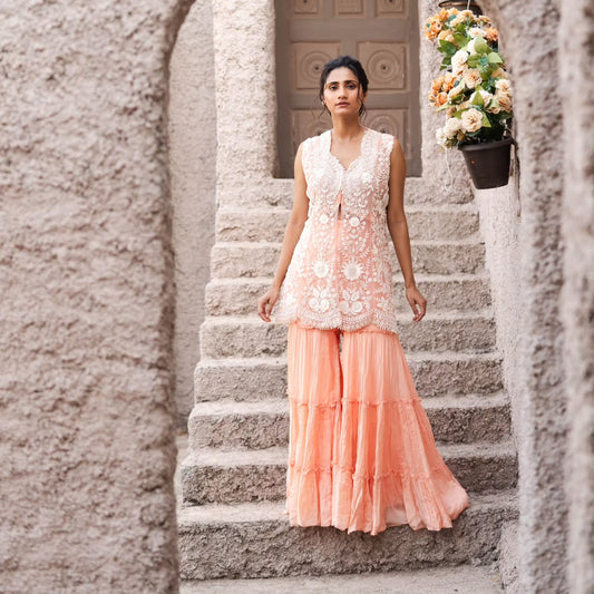 Peach taiwan net peplum top with flat chiffon lehenga pallazo
