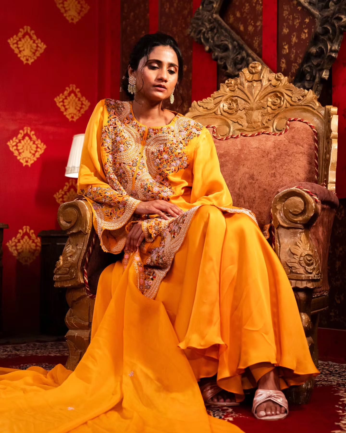 Yellow dupien silk peplum top with satin organza lehenga pallazo