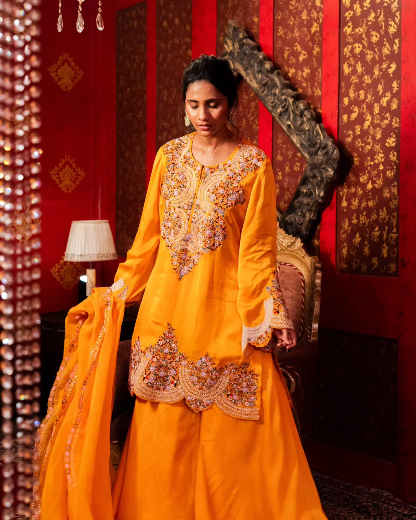 Yellow dupien silk peplum top with satin organza lehenga pallazo