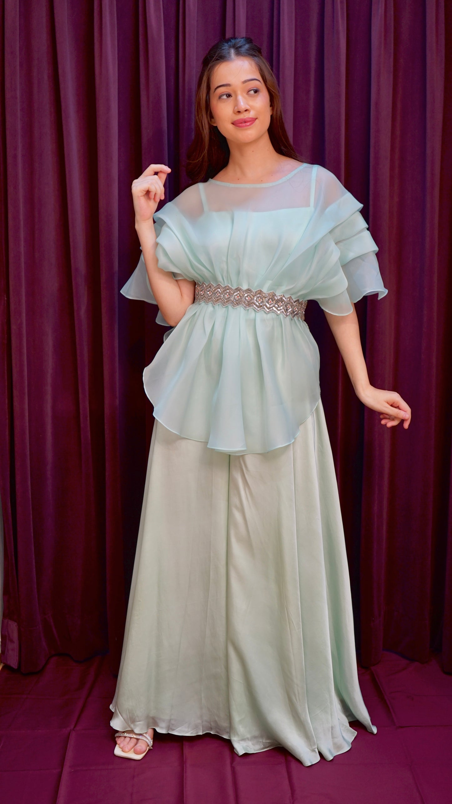 Pastel green top with flared bottoms