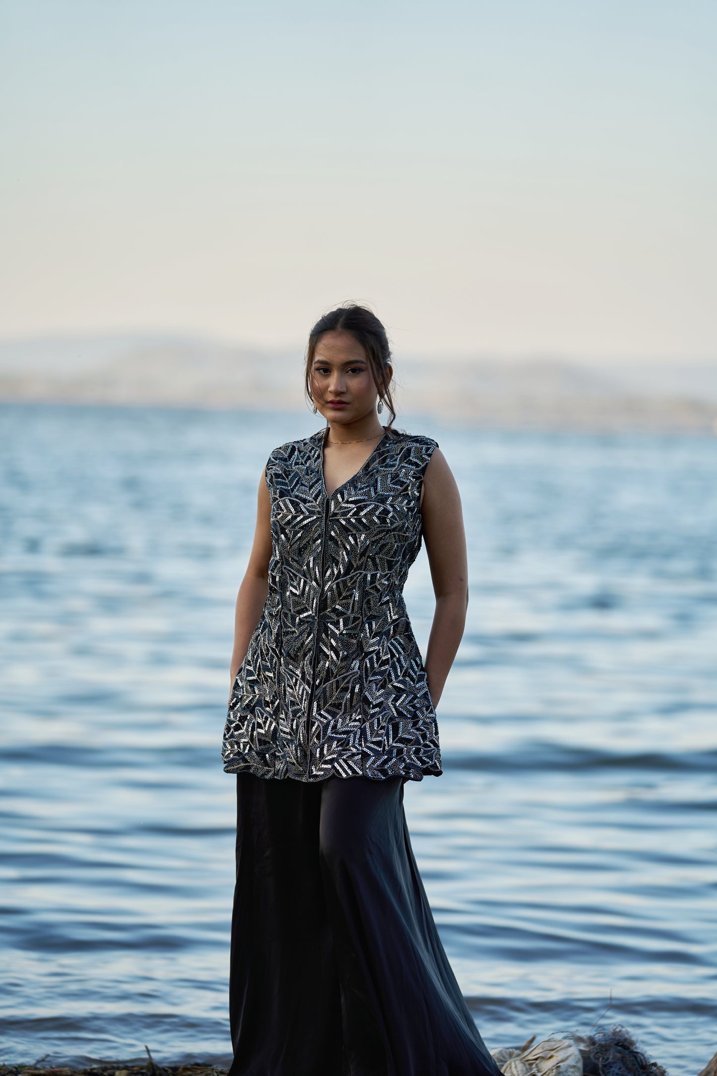 Black taiwan net peplum top with heavy satin lehenga pallazo