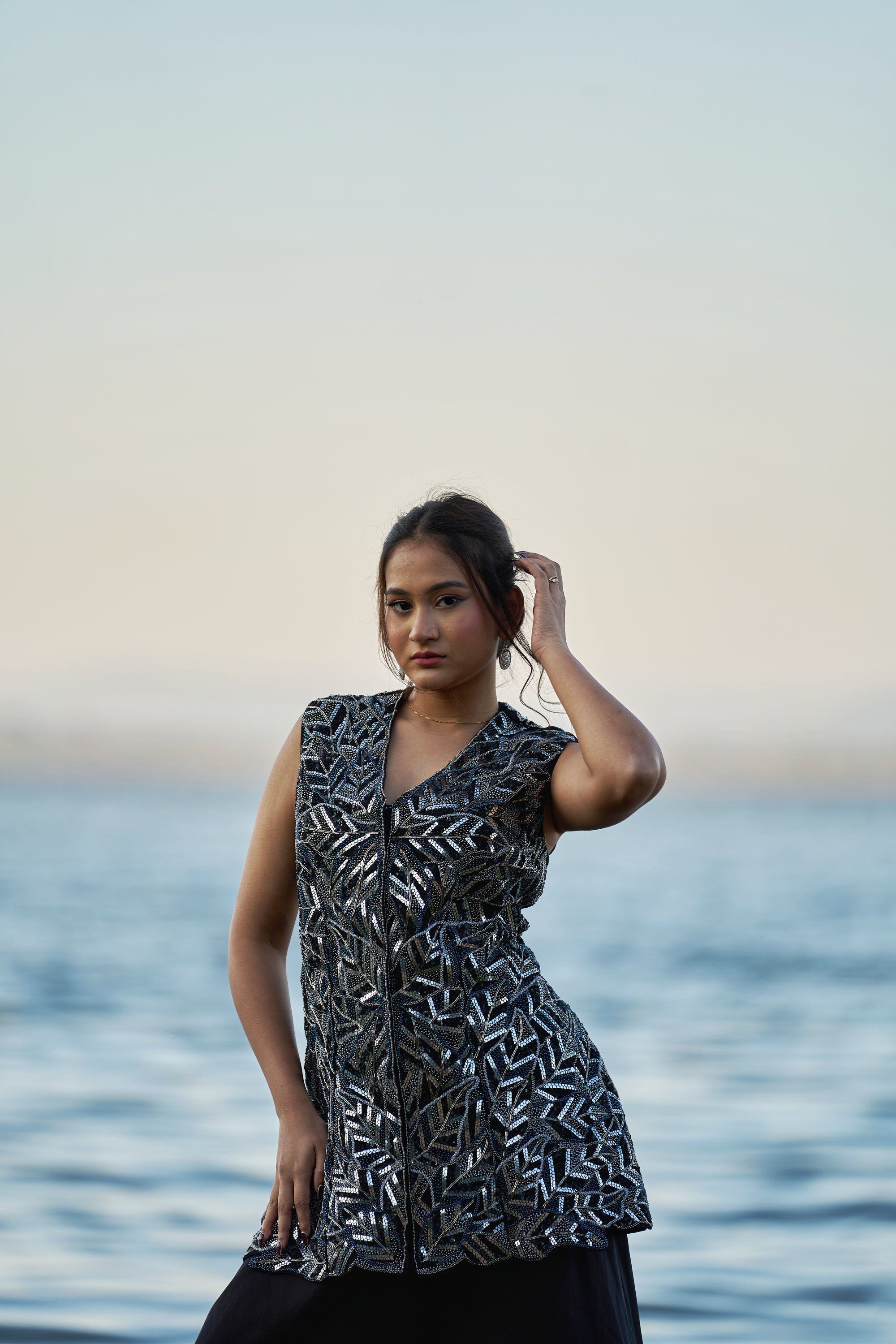 Black taiwan net peplum top with heavy satin lehenga pallazo