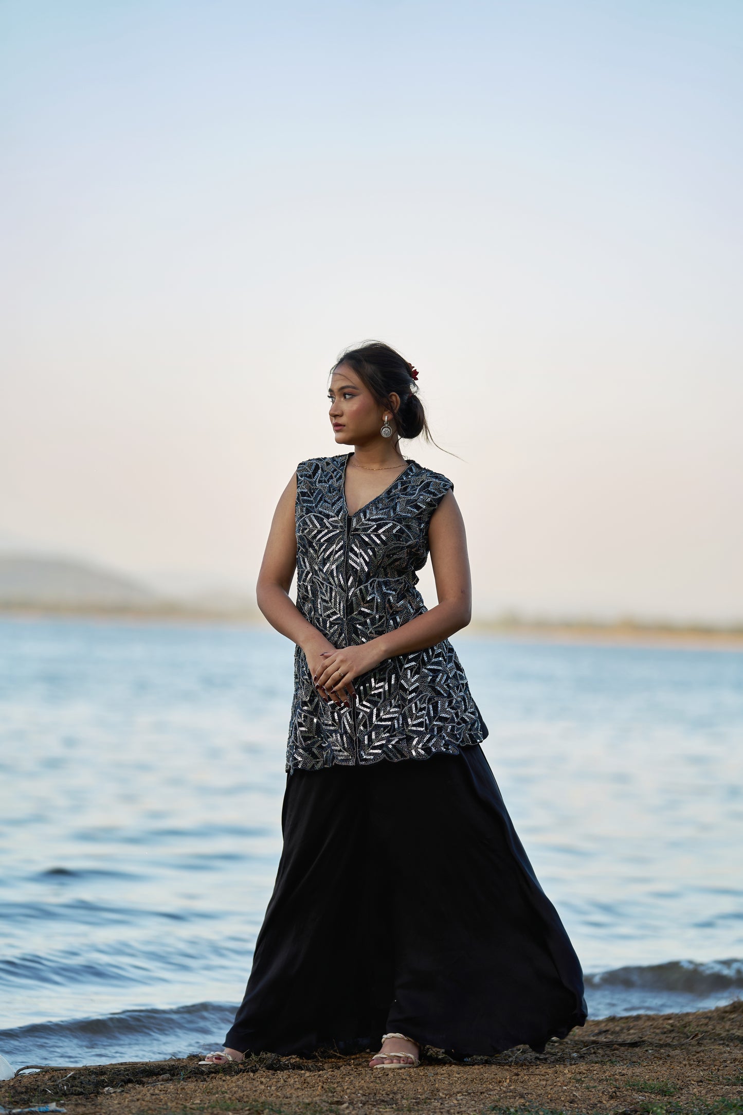 Black taiwan net peplum top with heavy satin lehenga pallazo