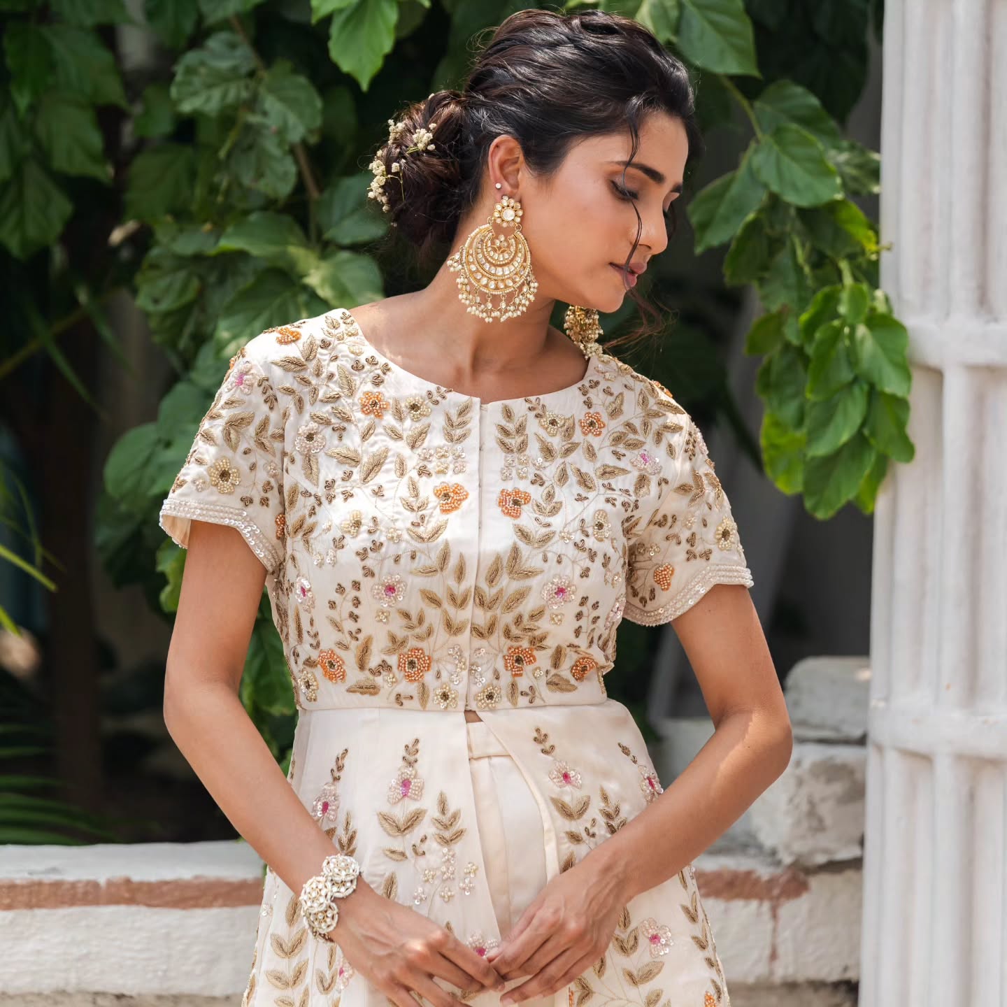 White satin organza peplum top with heavy satin lehenga pallazo