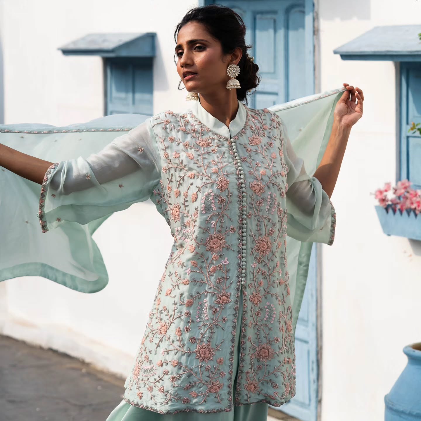 Light green upada silk peplum top with heavy satin lehenga pallazo
