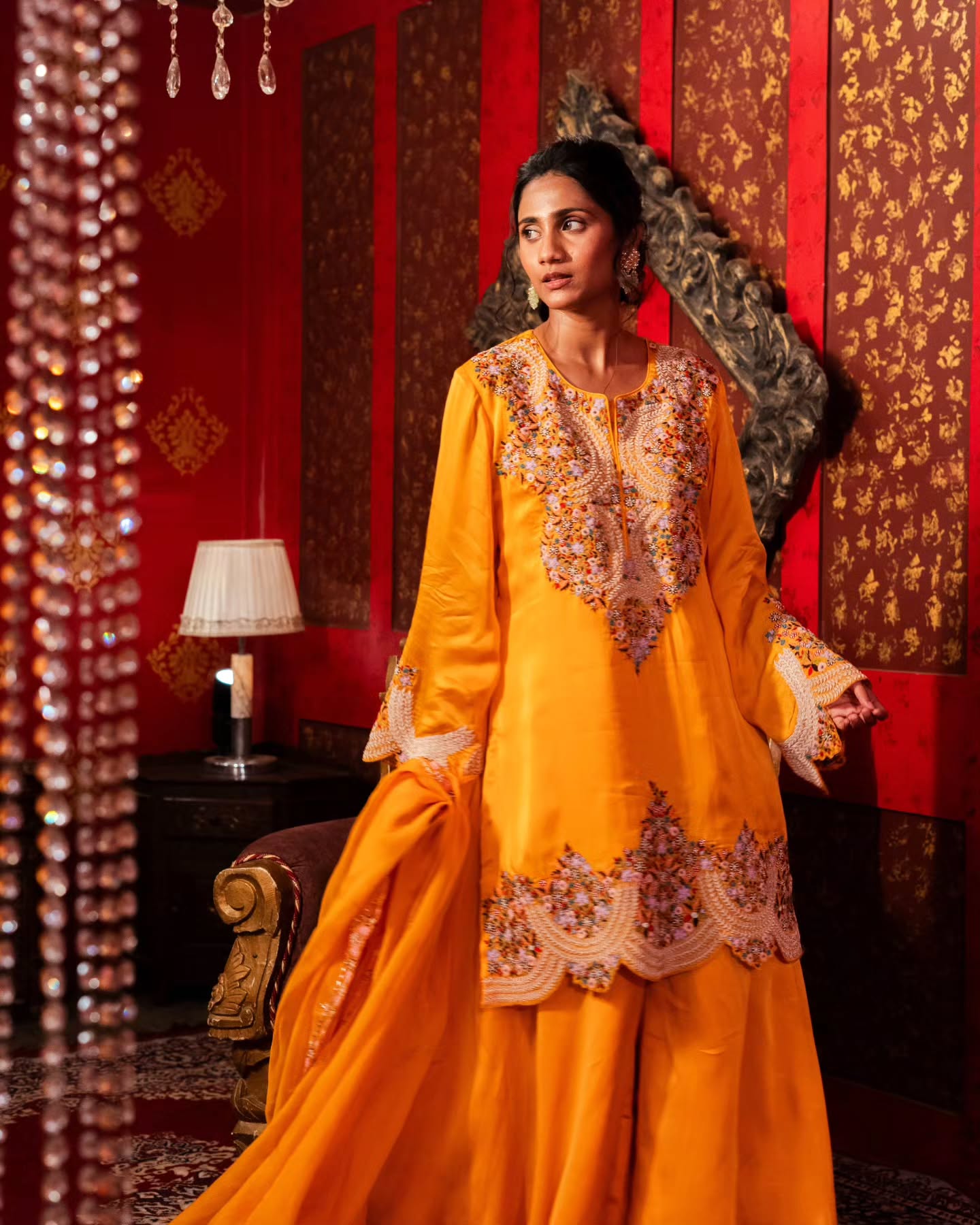 Yellow dupien silk peplum top with satin organza lehenga pallazo