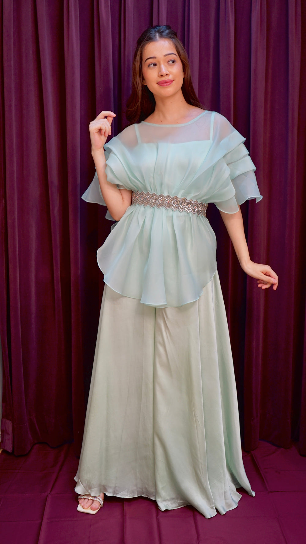 Pastel green top with flared bottoms