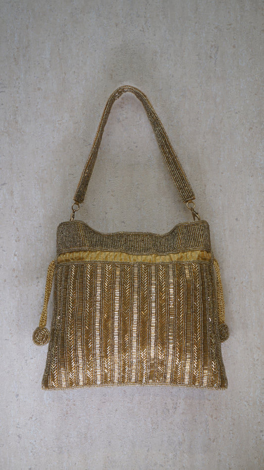 Golden clutch bag
