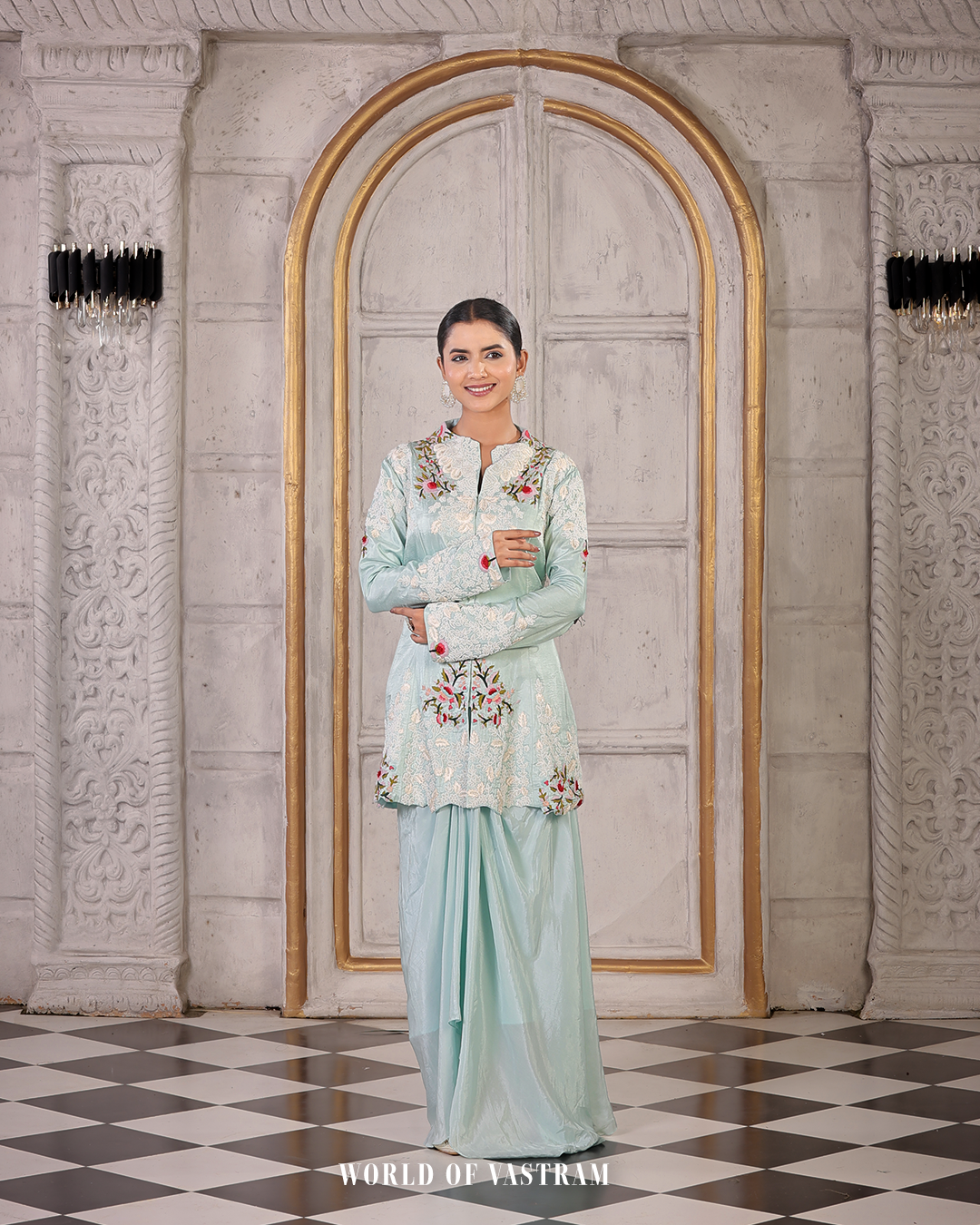 Powder blue peplum topwith draped skirts