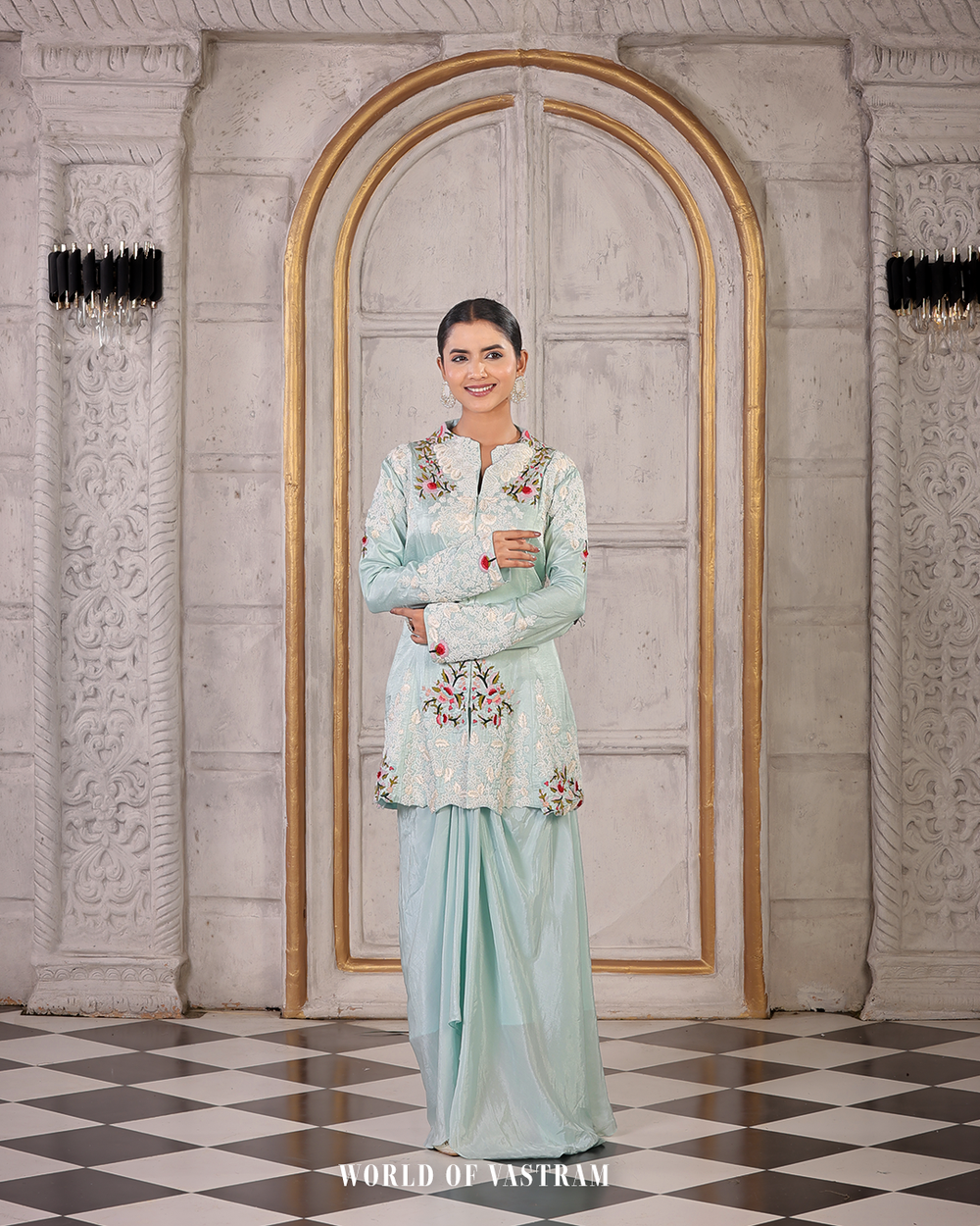 Powder blue peplum topwith draped skirts