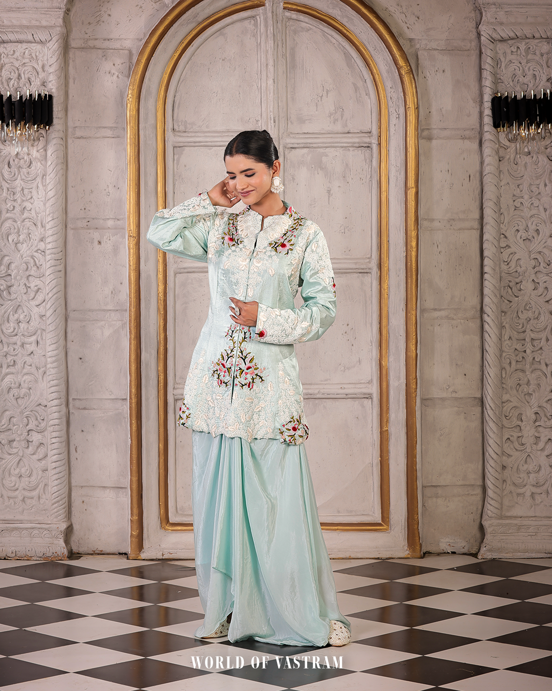 Powder blue peplum topwith draped skirts