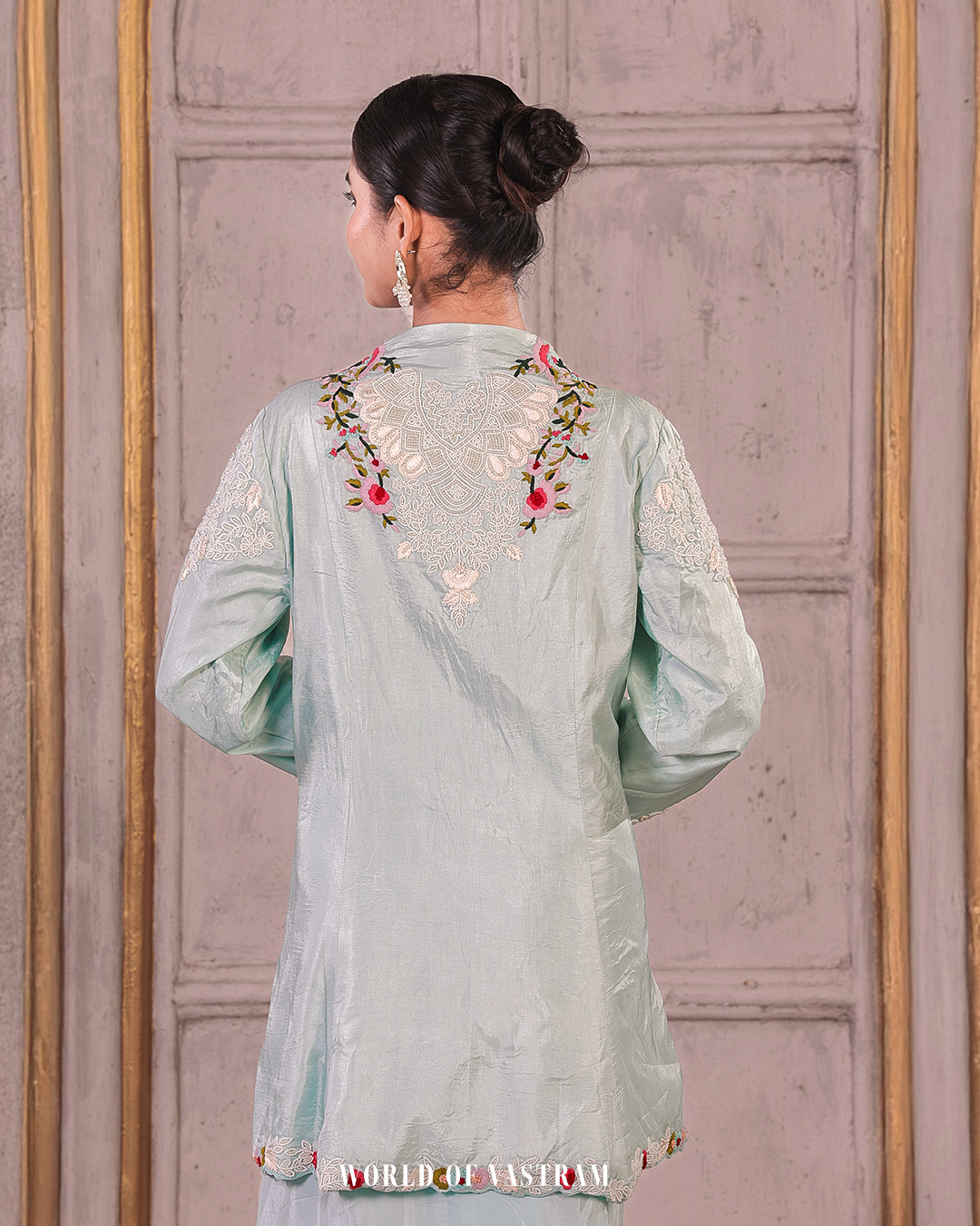 Powder blue peplum topwith draped skirts